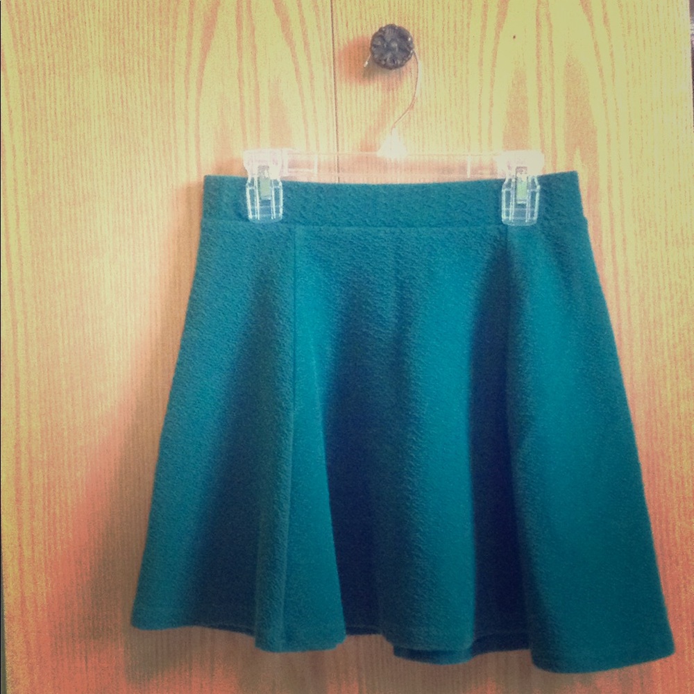 Green, zippered back, women's miniskirt